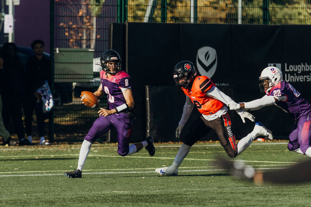 Adam Hydari playing American football at Loughborough University